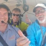 Pilot and spotter selfie in the helicopter looking for water hyacinth