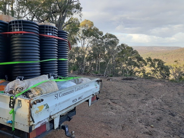 artificial nest boxes for black cockatoos on back of vehicle in bush setting