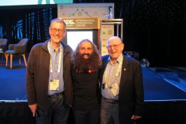 two men standing with Costa G